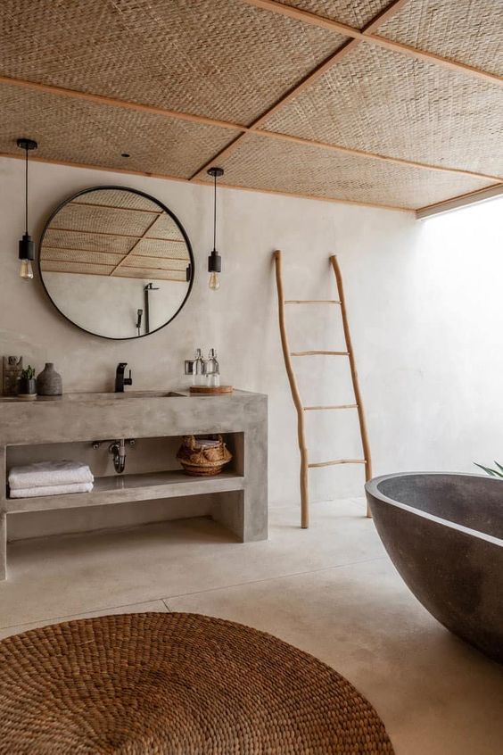 Une salle de bain zen et exotique avec bois et beton