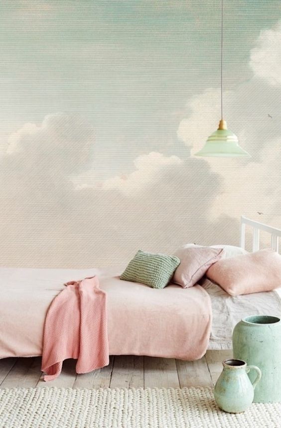 Chambre avec une décoration pastel verte et rose poudré