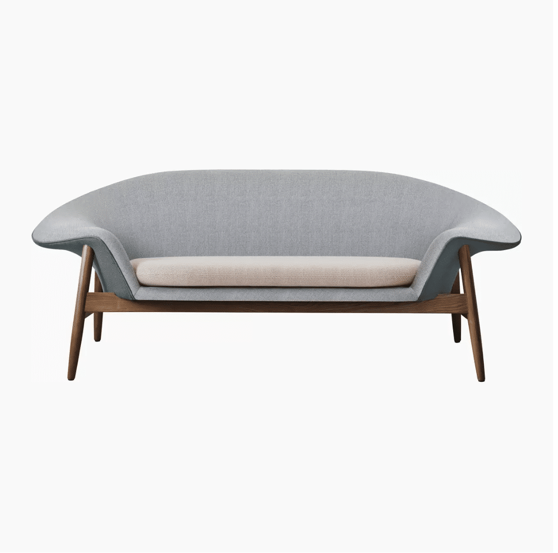 Un canapé arrondi au design scandinave