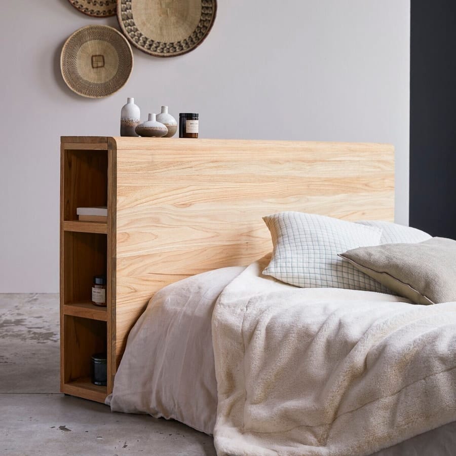 Une tete de lit minimaliste avec des rangements